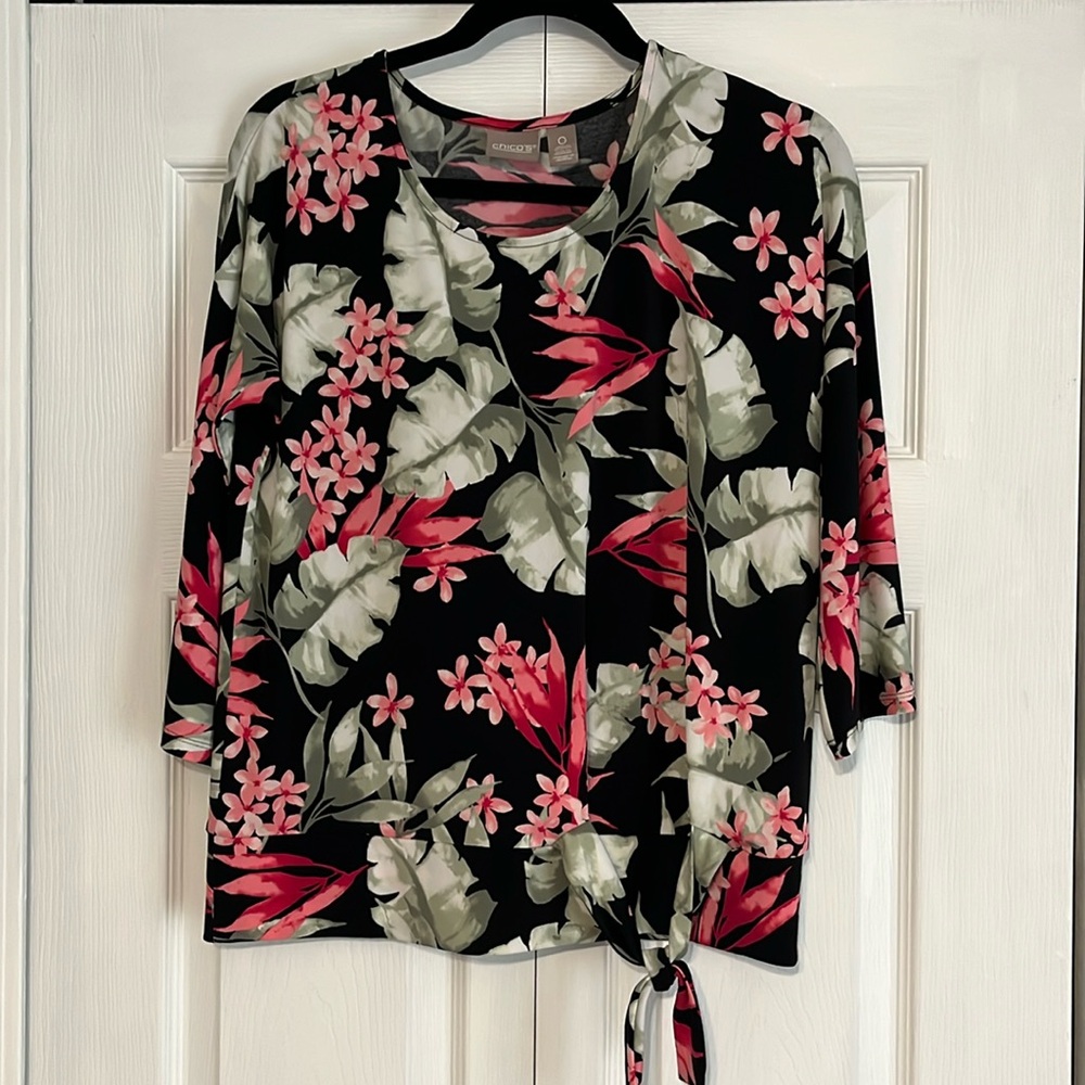 Chico size 0 .Three quarter length sleeve floral top.